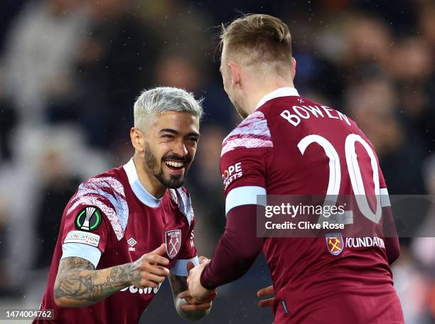 Jarrod Bowen of West Ham United celebrates with Manuel Lanzini after scoring the team's second goal during the UEFA Europa Conference League round of...