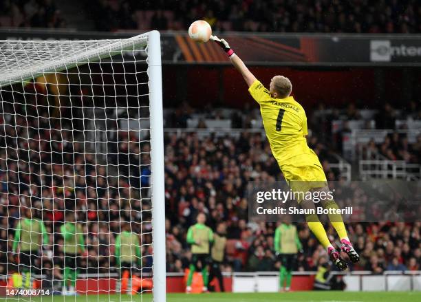 Aaron Ramsdale of Arsenal fails to save a shot from Pedro Goncalves of Sporting CP as he scores their side's first goal during the UEFA Europa League...