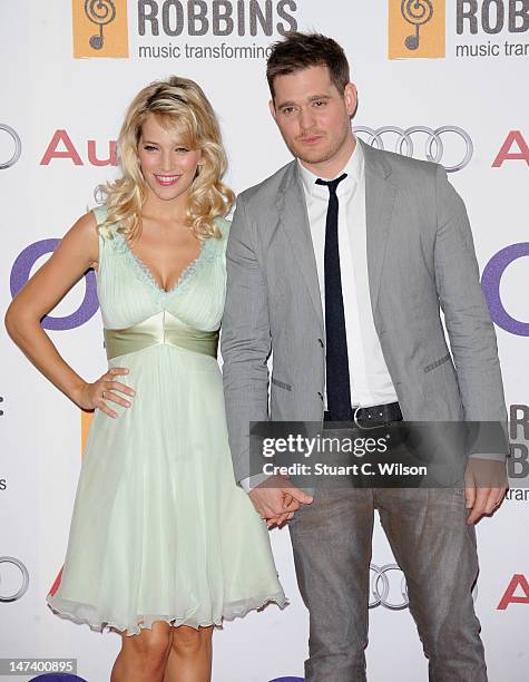 Luisana Lopilato and Singer Michael Buble attend the Nordoff Robbins O2 Silver Clef Awards at the London Hilton Hotel on June 29, 2012 in London,...
