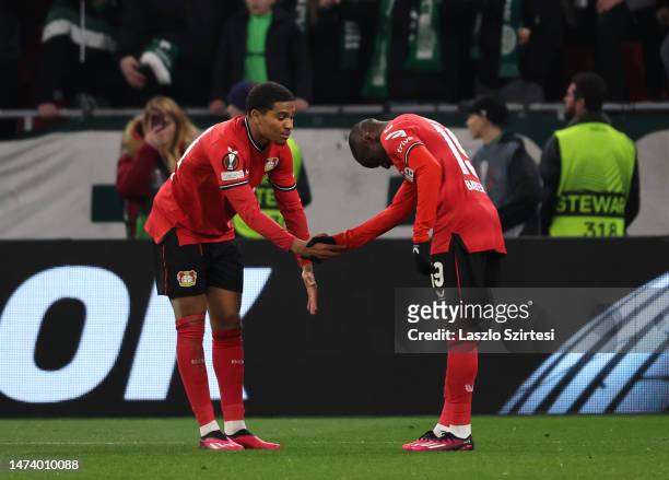 Amine Adli of Bayer 04 Leverkusen celebrates with teammate Moussa Diaby after scoring the teams first goal with Amine Adli during the UEFA Europa...