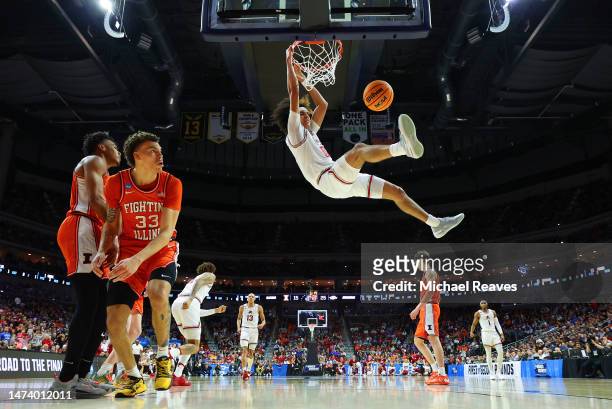 Anthony Black of the Arkansas Razorbacks dunks the ball against the Illinois Fighting Illini during the first half in the first round of the NCAA...