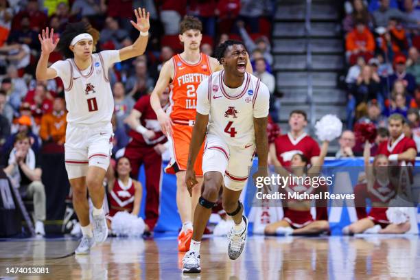 Davonte Davis of the Arkansas Razorbacks celebrates after scoring a three point basket against the Illinois Fighting Illini during the second half in...