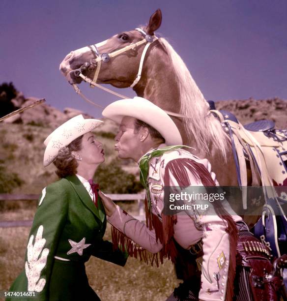 American actress, singer, and songwriter Dale Evans , husband American singer, actor, and television host Roy Rogers and his palomino horse named...