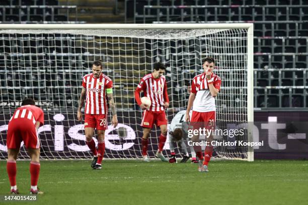 Robin Knoche of 1.FC Union Berlin looks dejected after conceding the third goal during the UEFA Europa League round of 16 leg two match between...