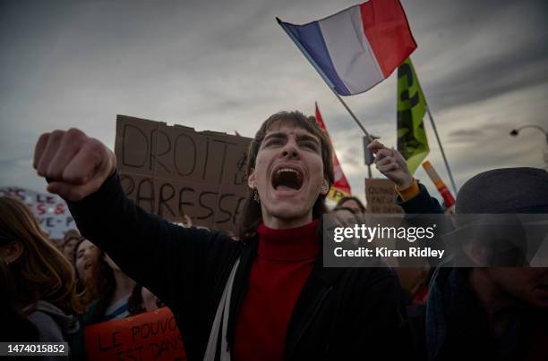 Protestors chant against the French Government during demonstrations at Place de la Concorde after the French Government pushed their Pension Reform...