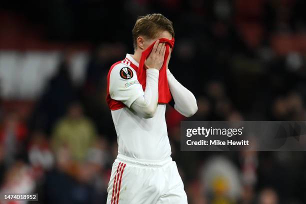 Martin Odegaard of Arsenal looks dejected following their side being knocked out of the UEFA Europa League after the UEFA Europa League round of 16...