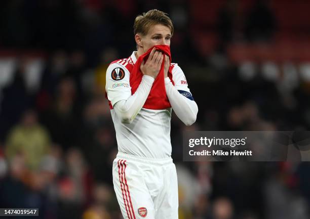 Martin Odegaard of Arsenal looks dejected following their side being knocked out of the UEFA Europa League after the UEFA Europa League round of 16...