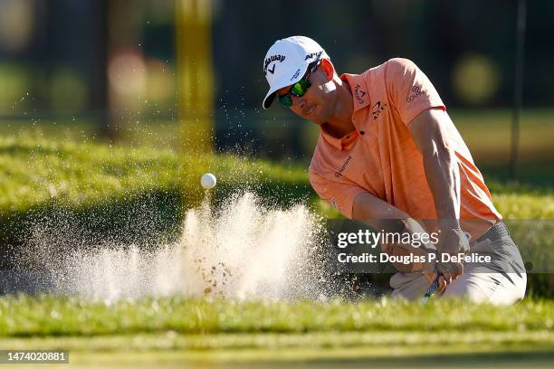 Dylan Frittelli of South Africa plays a shot from a bunker on the fifth hole during the first round of the Valspar Championship at Innisbrook Resort...