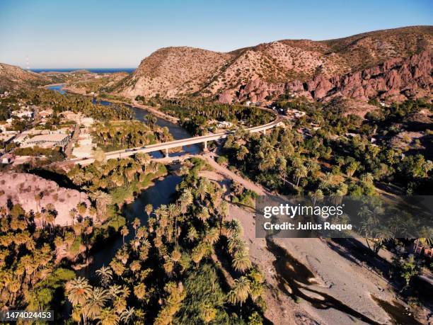 bridge over the river of mulege - baja california peninsula stock pictures, royalty-free photos & images