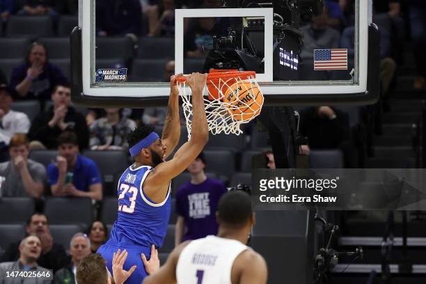 Naje Smith of the Boise State Broncos dunks against the Northwestern Wildcats during the first half in the first round of the NCAA Men's Basketball...