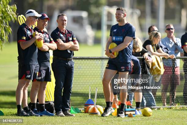 Alan Richardson, The Demons General Manager of AFL Football Operations and Steven May of the Demons watch on during a Melbourne Demons AFL training...