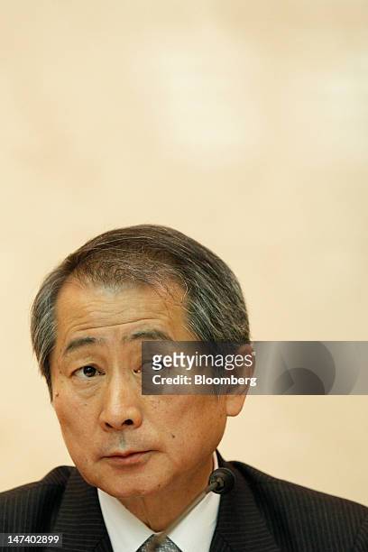 Kenichi Watanabe, president and chief executive officer of Nomura Holdings Inc., pauses during a news conference at the company's headquarters in...