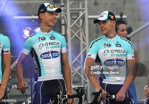 Tony Martin and Bert Grabsch of Germany and Omega Pharma-Quick Step team attend the Team Presentation ahead of the 2012 Tour de France at Place...