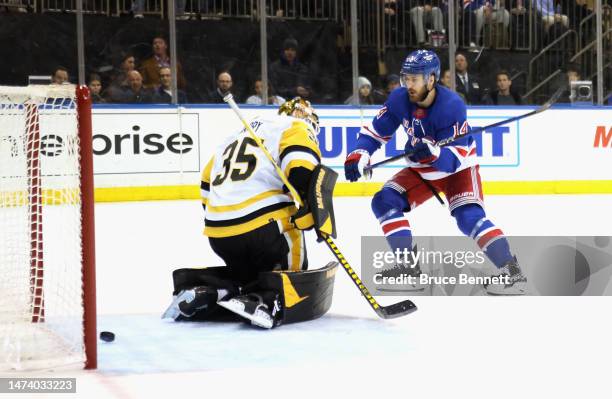 Tyler Motte of the New York Rangers scores a second period goal against Tristan Jarry of the Pittsburgh Penguins at Madison Square Garden on March...