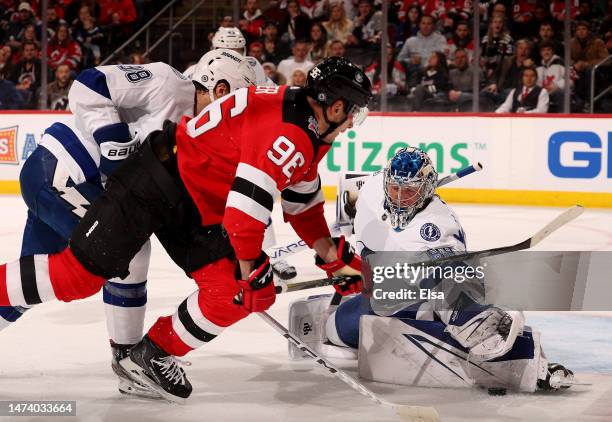 Andrei Vasilevskiy of the Tampa Bay Lightning stops a shot by Timo Meier of the New Jersey Devils during the second period at Prudential Center on...