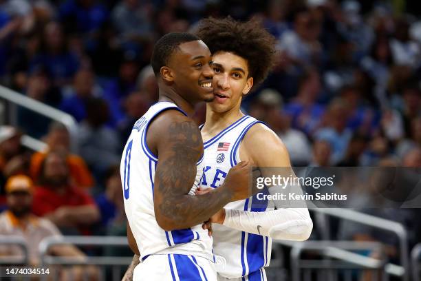 Dariq Whitehead of the Duke Blue Devils and Tyrese Proctor of the Duke Blue Devils react during the second half in the first round of the NCAA Men's...