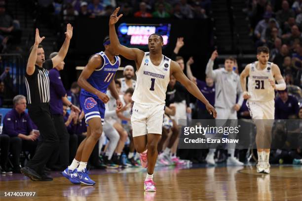 Chase Audige of the Northwestern Wildcats celebrates after a three point basket during the second half of a game against the Boise State Broncos in...