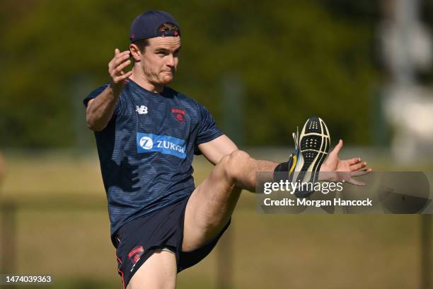 Bayley Fritsch of the Demons kicks the ball during a Melbourne Demons AFL training session at Gosch's Paddock on March 17, 2023 in Melbourne,...