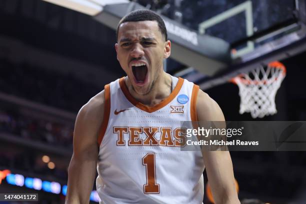 Dylan Disu of the Texas Longhorns reacts after a play during the second half against the Colgate Raiders in the first round of the NCAA Men's...
