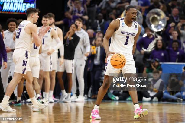 Chase Audige of the Northwestern Wildcats reacts after beating the Boise State Broncos 75-67 in the first round of the NCAA Men's Basketball...