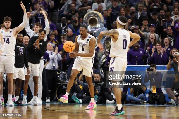 Chase Audige of the Northwestern Wildcats reacts after beating the Boise State Broncos 75-67 in the first round of the NCAA Men's Basketball...