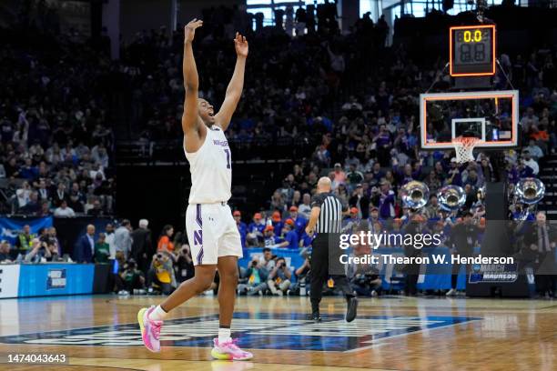 Chase Audige of the Northwestern Wildcats celebrates after beating the Boise State Broncos 75-67 in the first round of the NCAA Men's Basketball...