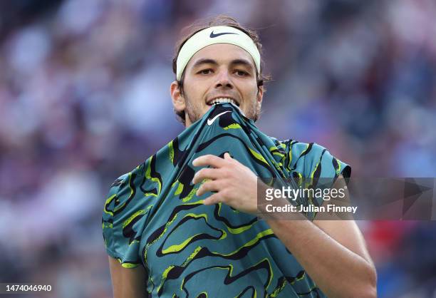 Taylor Fritz of USA reacts against Jannik Sinner of Italy in the quarter finals during the BNP Paribas Open on March 16, 2023 in Indian Wells,...