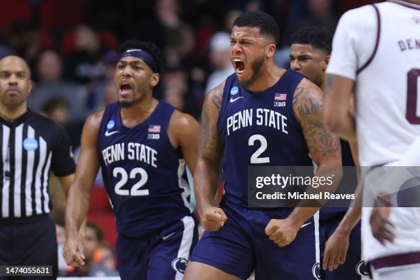 Jalen Pickett and Myles Dread of the Penn State Nittany Lions celebrate after a play during the second half against the Texas A&M Aggies in the first...