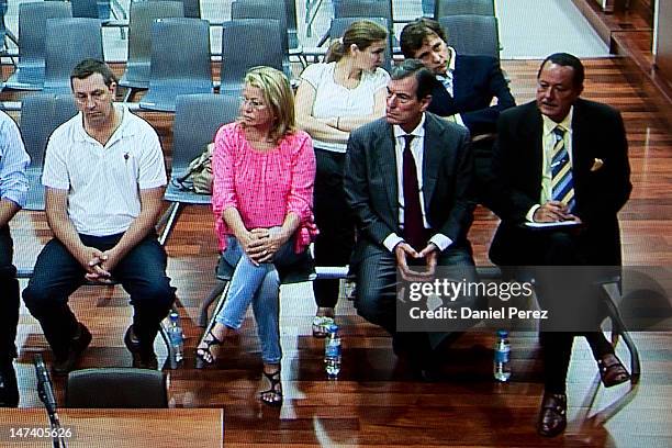 Ex-mayor of Marbella Julian Munoz and Maite Zaldivar take their seats for a corruption trial on June 28, 2012 in Malaga, Spain. The corruption...