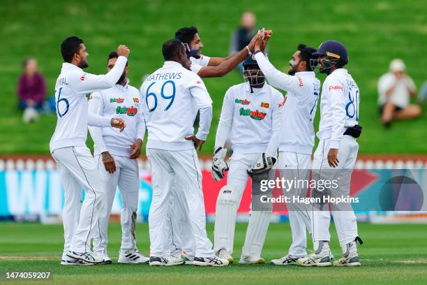 Sri Lanka celebrate the wicket of Devon Conway of New Zealand during day one of the Second Test Match between New Zealand and Sri Lanka at Basin...