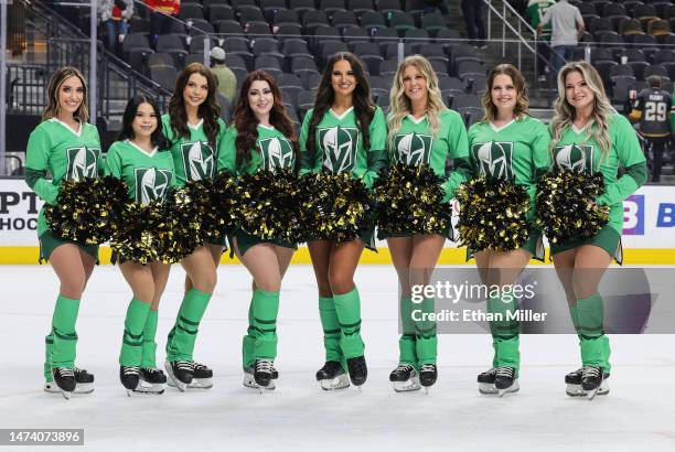 Members of the Knights Guard, wearing St. Patrick’s Day outfits, pose on the ice after the Vegas Golden Knights' 7-2 loss to the Calgary Flames at...