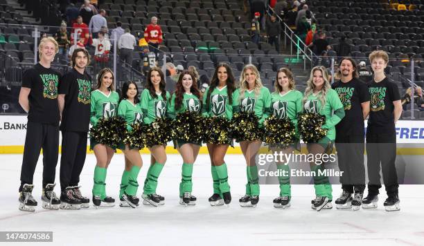 Members of the Knights Guard, wearing St. Patrick’s Day outfits, pose on the ice after the Vegas Golden Knights' 7-2 loss to the Calgary Flames at...