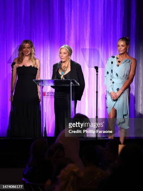 Quinn Ezralow, Co-founder and Gala Chair, WCRF, Kelly Chapman Meyer, and Jamie Tisch, Co-founder and Gala Chair, WCRF speak onstage during An...