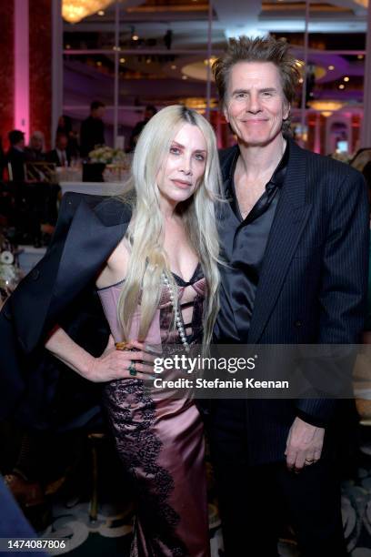 Gela Nash and John Taylor attend An Unforgettable Evening at Beverly Wilshire, A Four Seasons Hotel on March 16, 2023 in Beverly Hills, California.