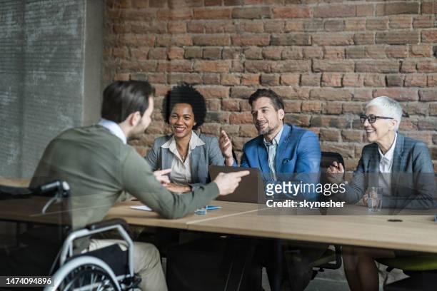 happy human resource team talking to disabled candidate. - weakness stock pictures, royalty-free photos & images