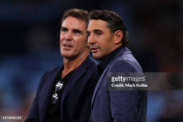 Blues state of origin coach Brad Fittler speaks to Queensland Maroons state of origin coach Billy Slater during the warm-up before the round three...