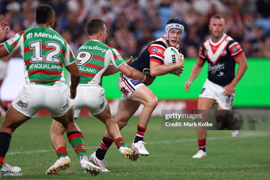 Luke Keary of the Roosters is tackled during the round three NRL ...