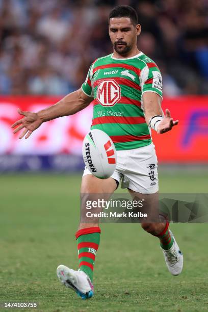 Cody Walker of the Rabbitohs kicks the ball during the round three NRL match between Sydney Roosters and South Sydney Rabbitohs at Allianz Stadium on...