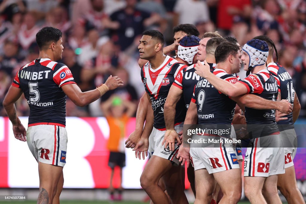 Daniel Tupou of the Roosters celebrates with team mates after scoring ...