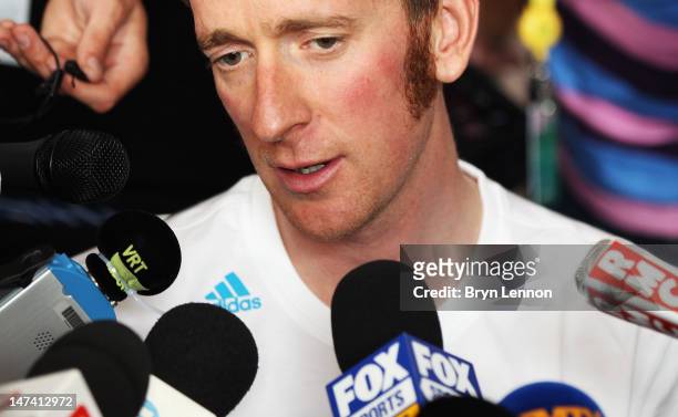 Bradley Wiggins of Great Britain and SKY Procycling chats to the media during a team press conference ahead of the 2012 Tour de France on June 29,...