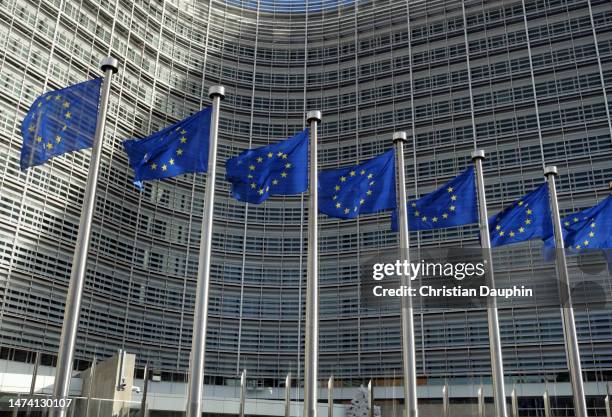 european commission, european flags at berlaymont building. - european commission officials stock pictures, royalty-free photos & images