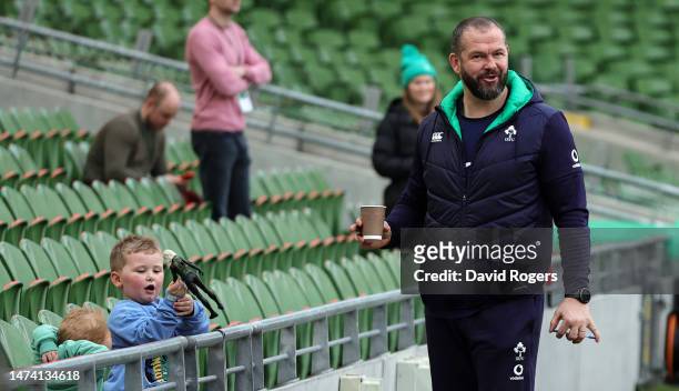 Andy Farrell, the Ireland head coach, with his grandchild, Tommy, during the Ireland captain's run at the Aviva Stadium on March 17, 2023 in Dublin,...