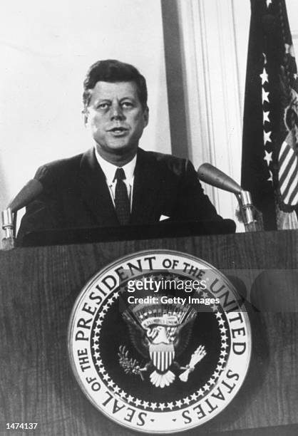 President John F. Kennedy speaks during a televised speech to the nation about the Cuban missile crisis February 11, 1962 in Washington, DC. Former...