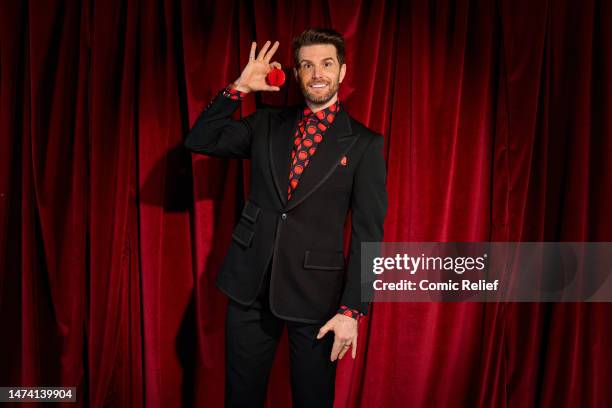 Joel Dommett poses during the Red Nose Day night of TV for Comic Relief on March 17, 2023 in Manchester, England.