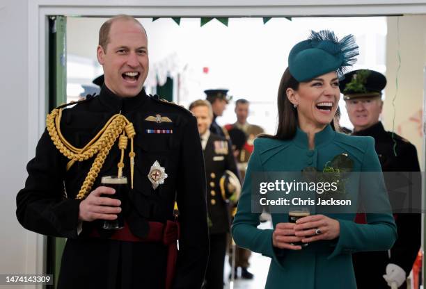 Prince William, Prince of Wales and Catherine, Princess of Wales laughing and enjoying a glass of Guinness after the St. Patrick's Day Parade at Mons...