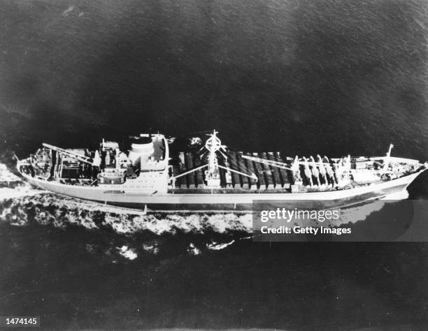 The Soviet ship Kasimov is shown just off Cuba with fifteen I1-28 aircraft on board December 10, 1962. Fuselage crates on the ship were opened by the...