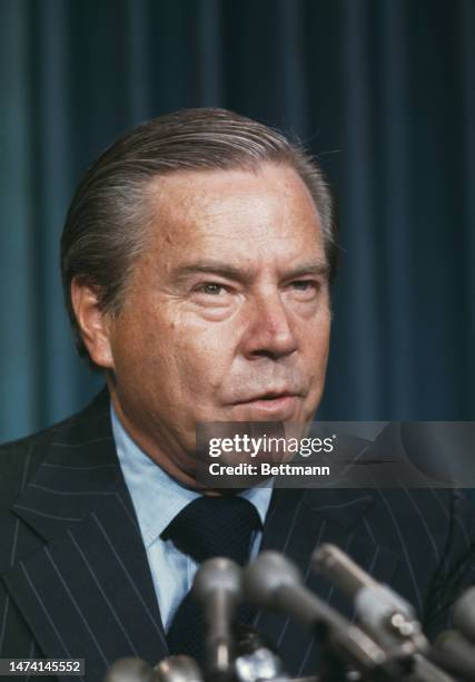 Republican Representative John J Rhodes , the House Minority Leader, speaking at a press conference on August 8th, 1974.