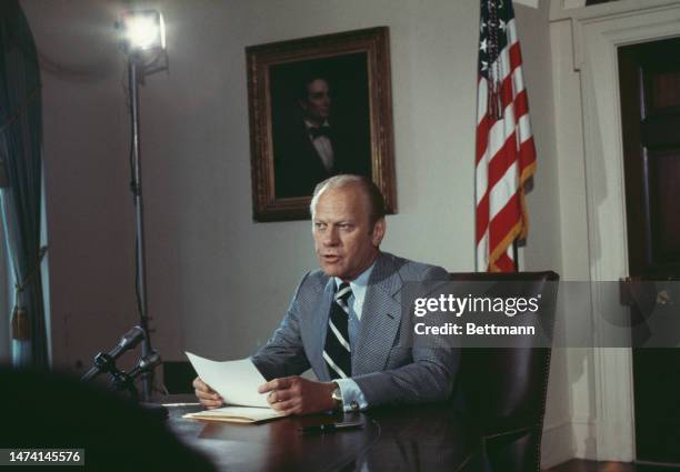 President Gerald Ford delivers a speech offering a conditional amnesty to Vietnam era draft evaders, in the White House Cabinet Room, Washington, on...