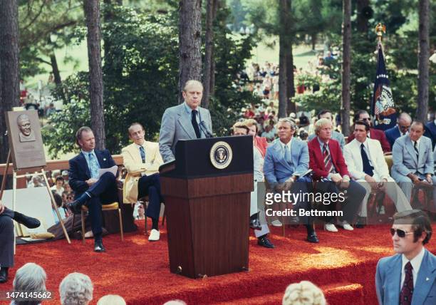 President Gerald Ford speaks at the opening of the World Golf Hall of Fame in Pinehurst, North Carolina, on September 12th, 1974. On the podium are...