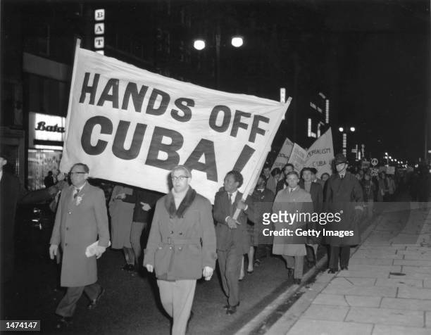 Members of the Campaign for Nuclear Disarmament march during a protest against the U.S.'s action over the Cuban missile crisis October 28, 1962 in...